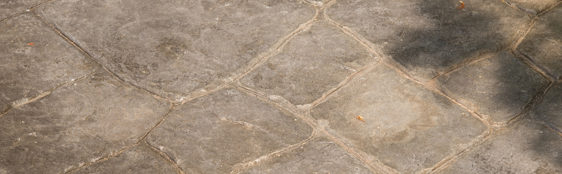 Stamped Concrete vs. Pavers: Which Is Better for Your Outdoor Space?