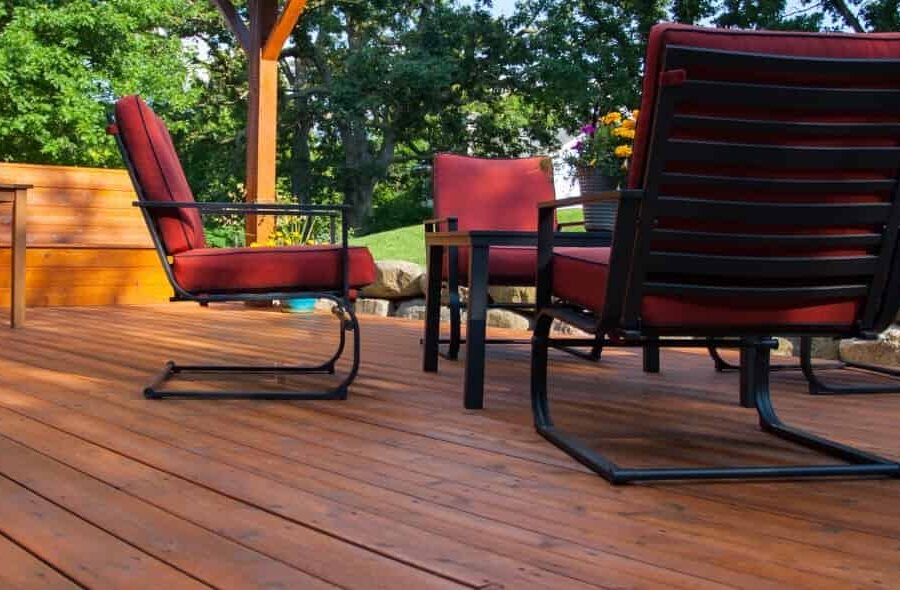Beautifully finished outdoor wood deck with patio furniture