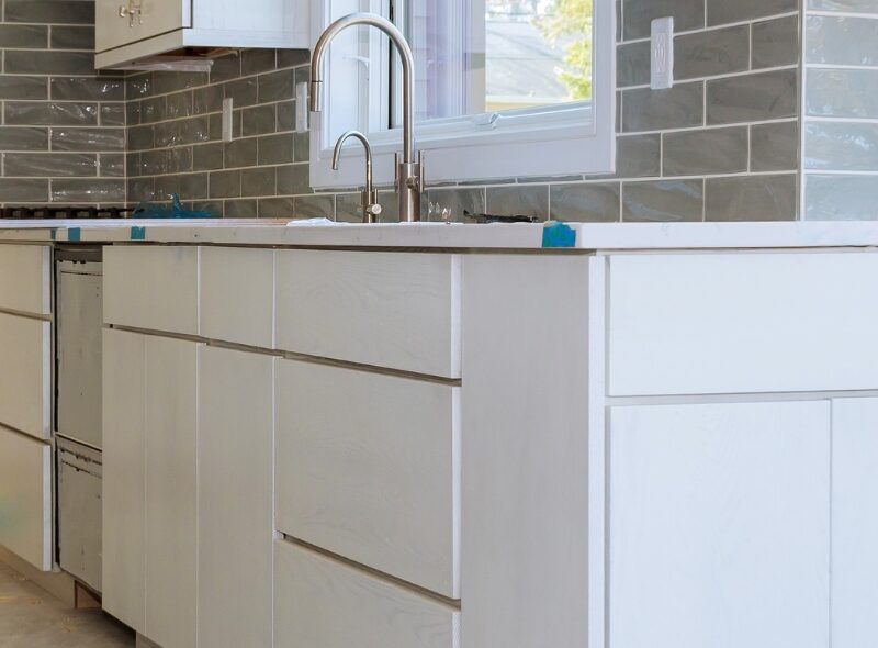 Modern kitchen with gray tile backsplash