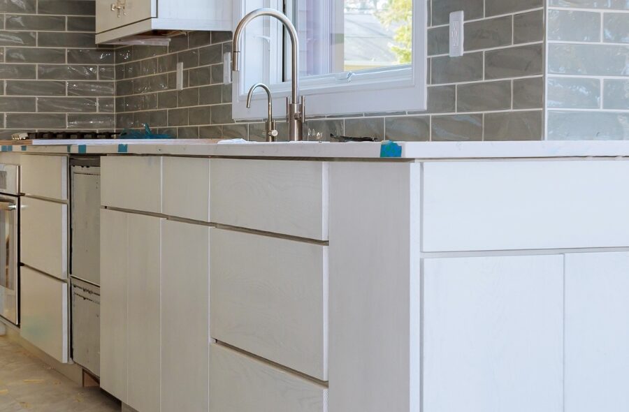 Modern kitchen with gray tile backsplash