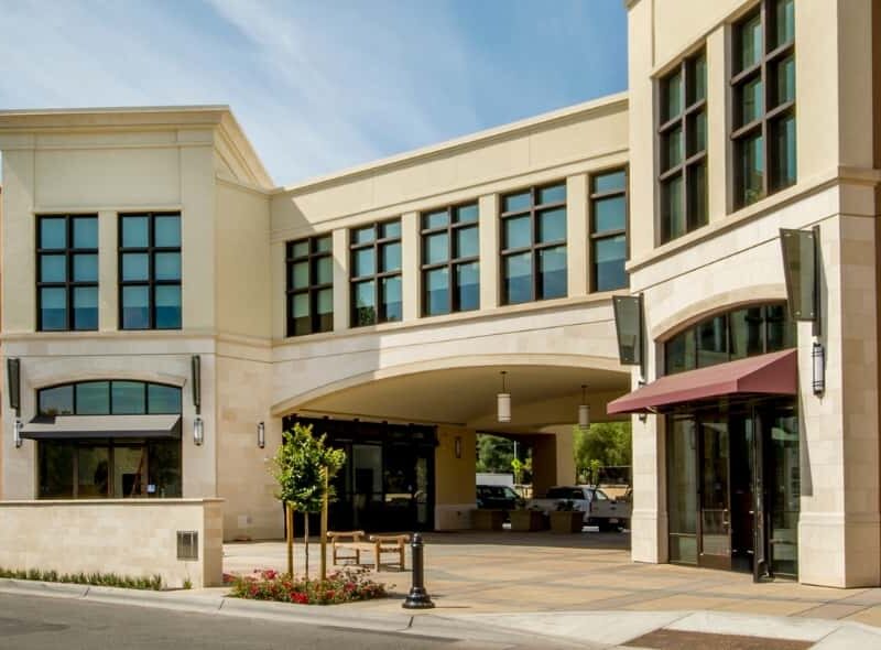 Completed commercial buildout exterior showing a modern retail and office building
